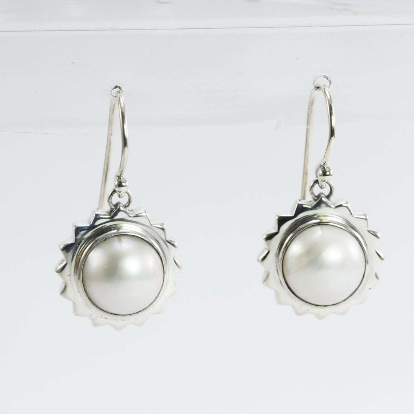 white mabe pearl earrings set in 925 sterling silver