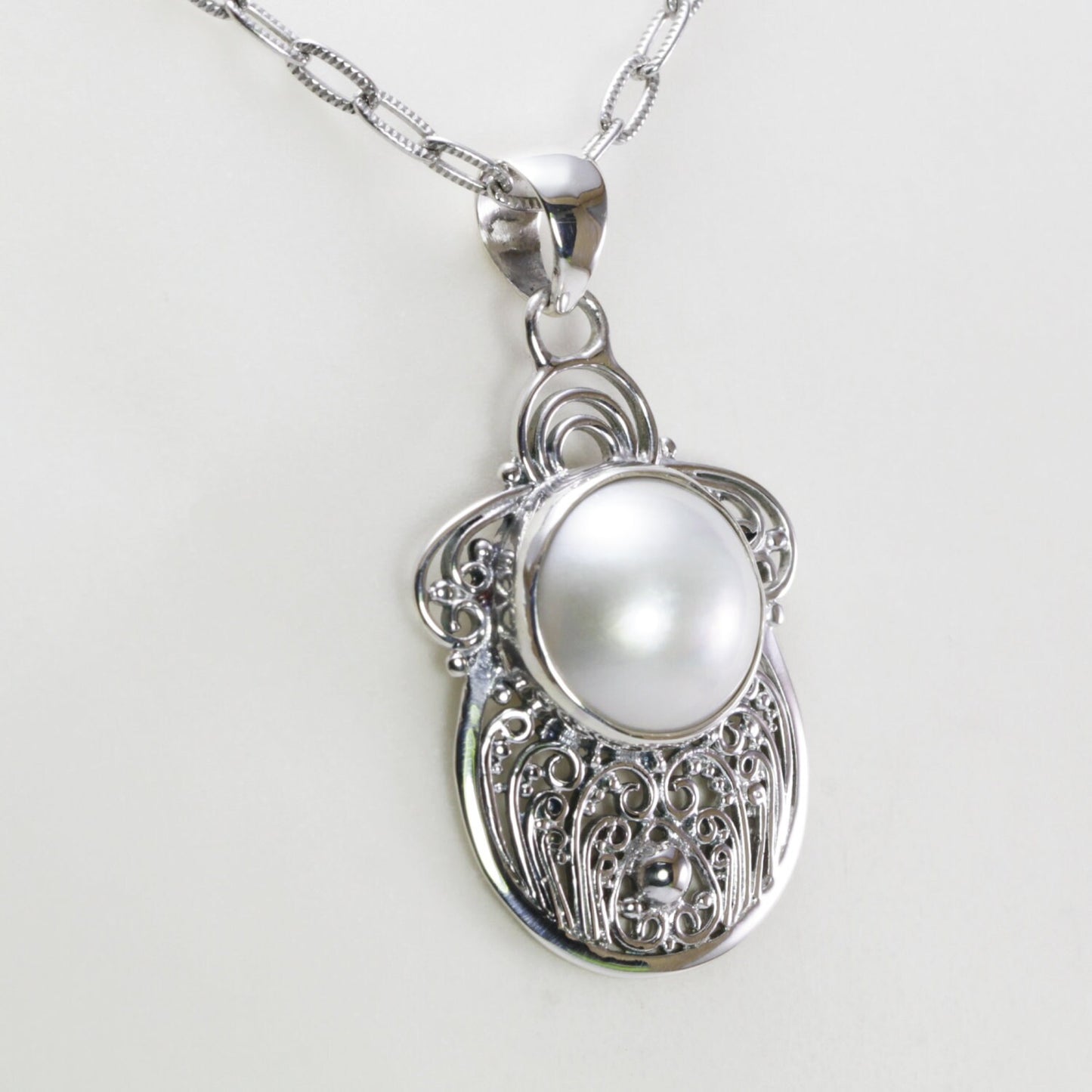 white mabe pearl pendant necklace 925 sterling silver decorated with filigree ornament