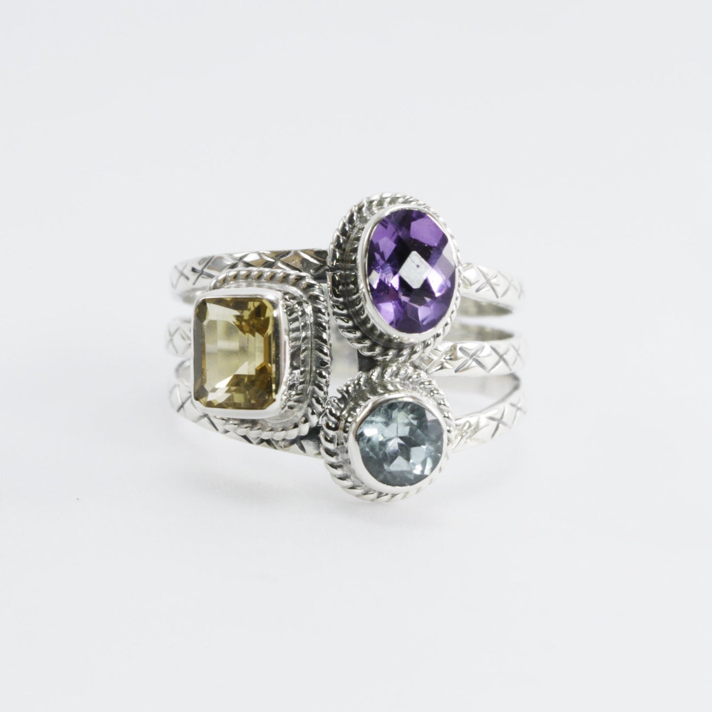 Three stones ring set in 925 sterling silver, combination of natural amethyst, citrine, and blue topaz decorated with cable rope