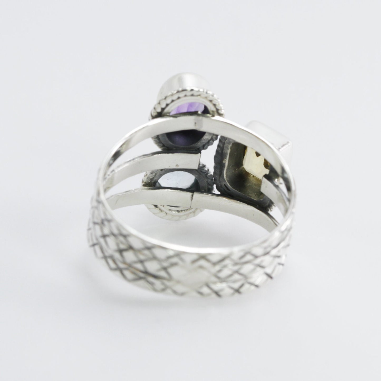 Three stones ring set in 925 sterling silver, combination of natural amethyst, citrine, and blue topaz decorated with cable rope