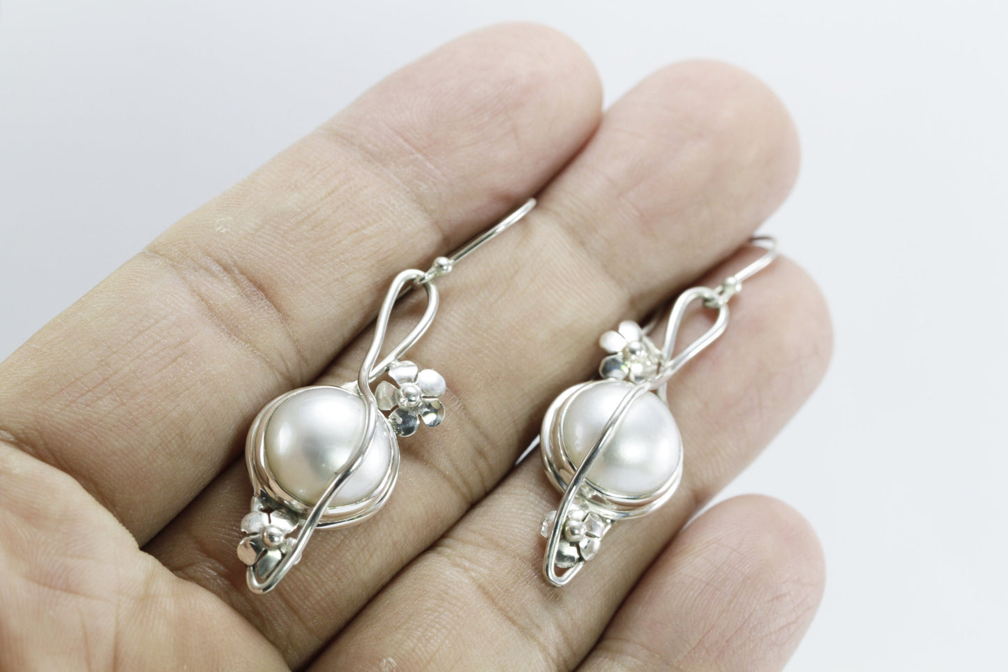 white mabe earrings dangle set in 925 sterling silver decorated with rope ornament