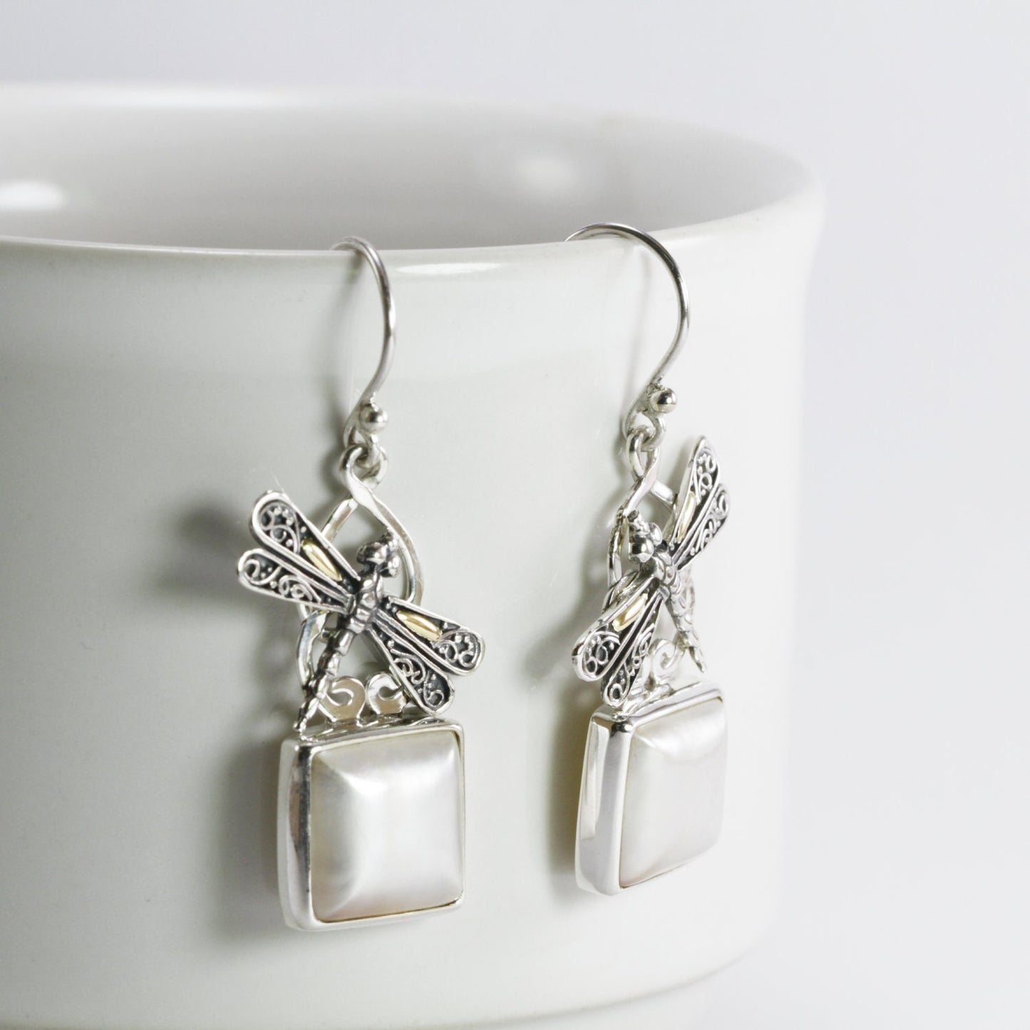 square pearl earrings set in 925 sterling silver decorated with two tone dragonfly ornament 18 K gold