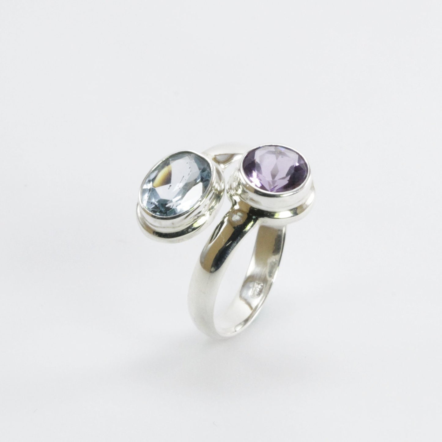 bypass ring with round blue topaz and amethyst bezel set in 925 sterling silver, adjustable promise ring