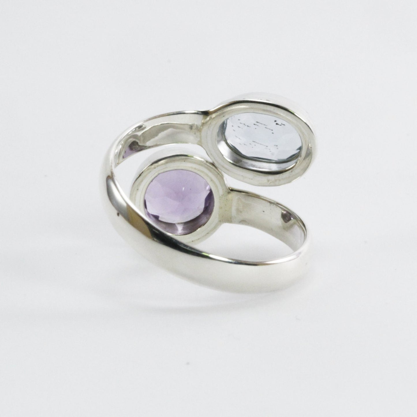 bypass ring with round blue topaz and amethyst bezel set in 925 sterling silver, adjustable promise ring