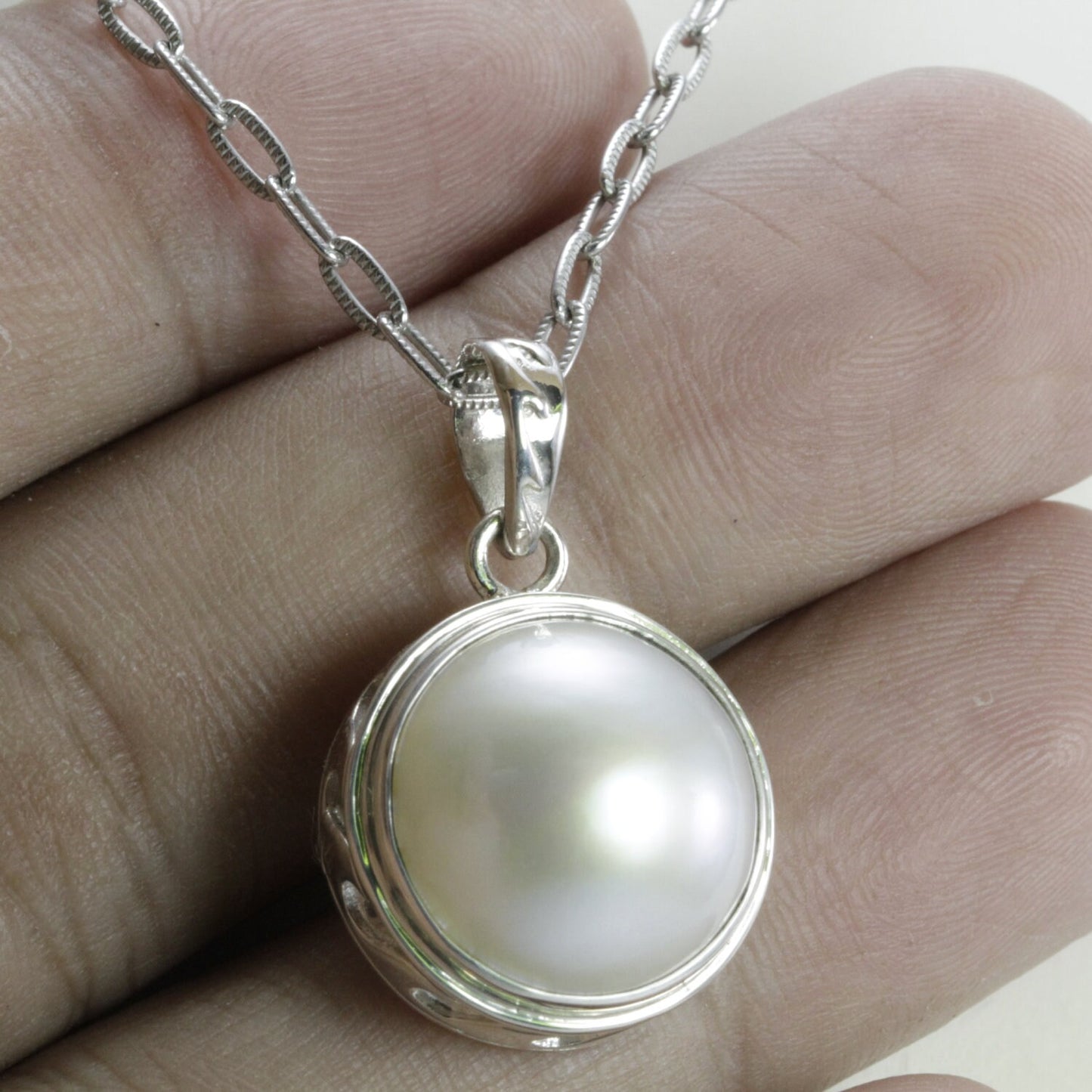 Genuine round 15 MM white Mabe pearl set in 925 sterling silver pendant bezel set decorated with sea wave art carving