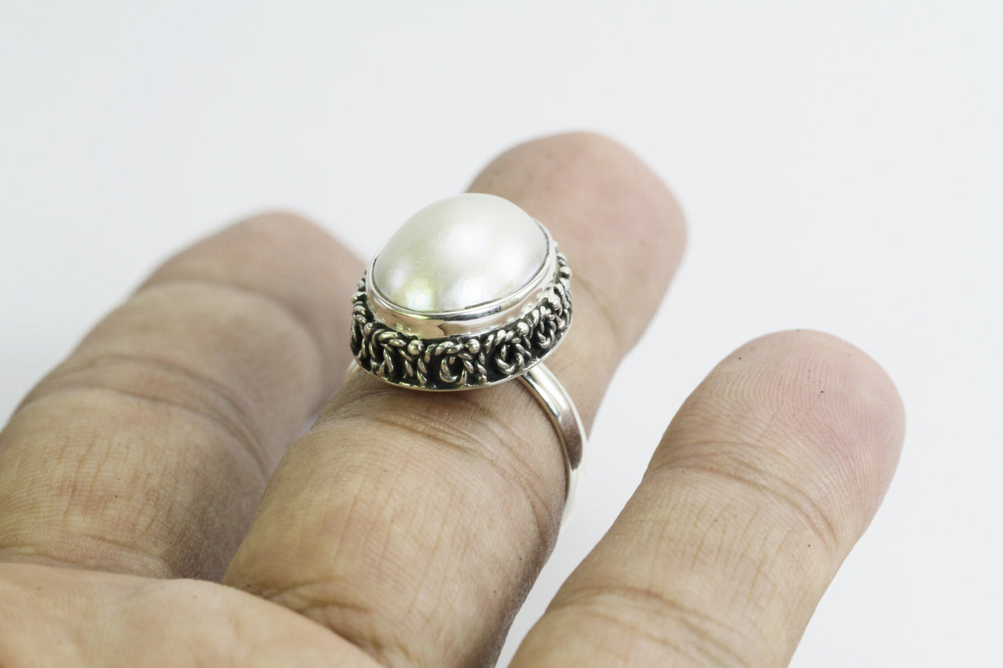 mabe pearl ring 925 sterling silver oval shape 17*14 mm decorated with swirl crown filigree ornament