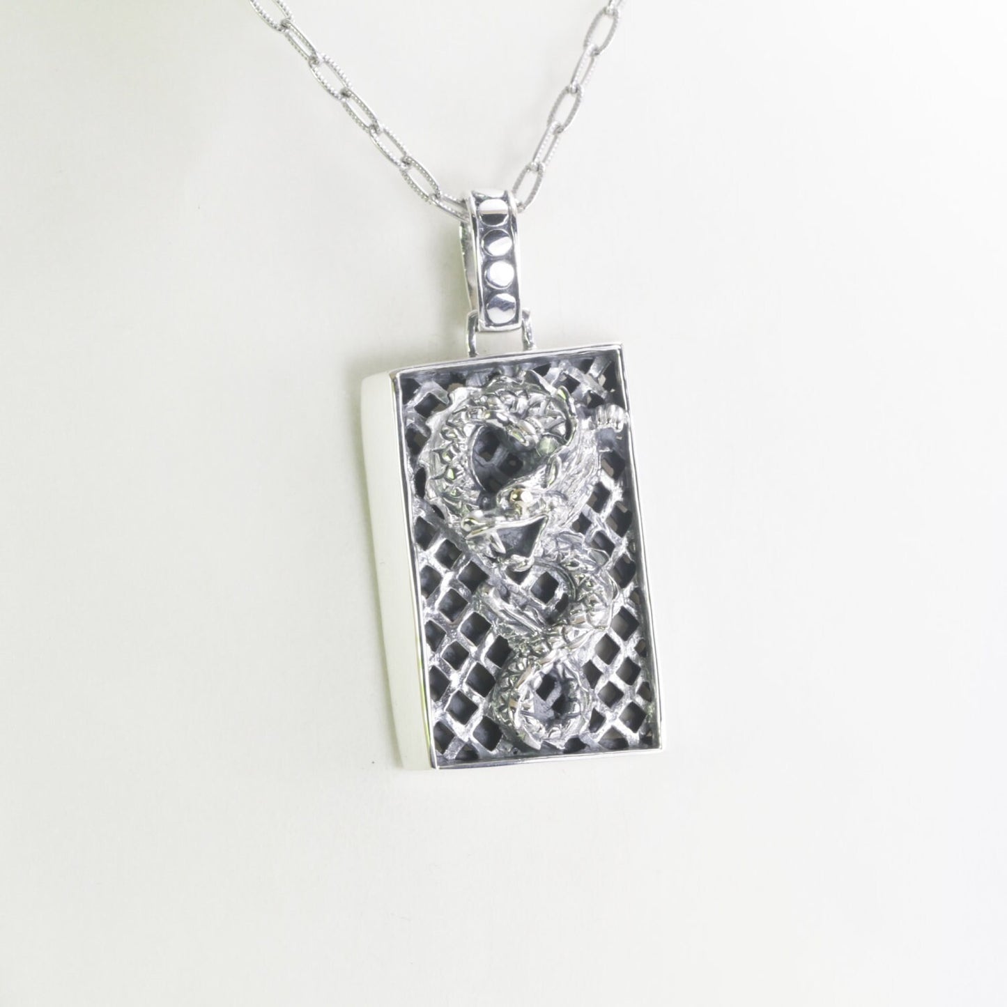 silver dragon necklace pendant decorated with 18K yellow gold on the eye, dragon pendant silver