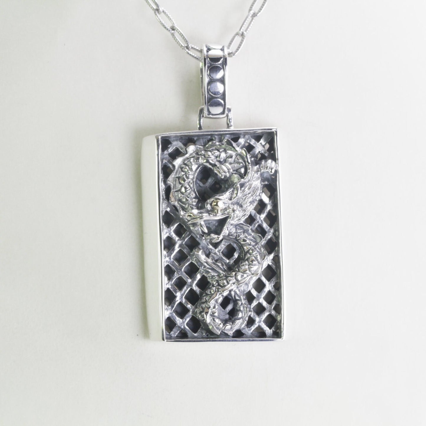 silver dragon necklace pendant decorated with 18K yellow gold on the eye, dragon pendant silver