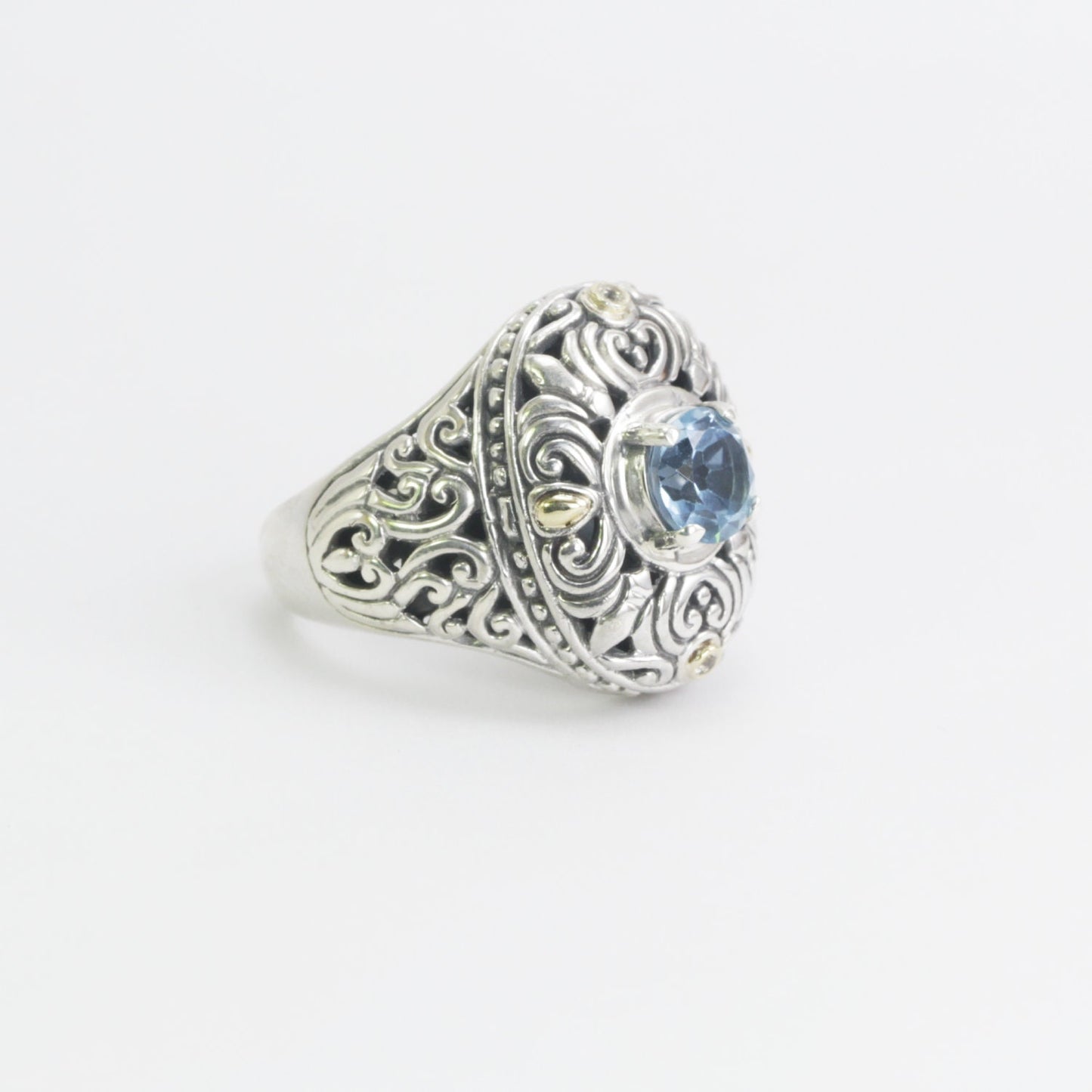 blue topaz ring 925 sterling silver decorated with filigree ornament and 18 K yellow gold