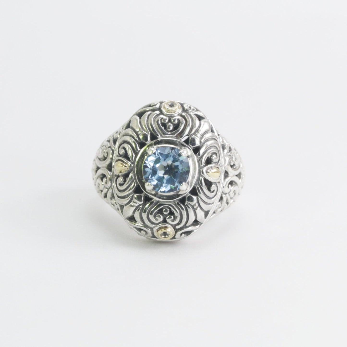 blue topaz ring 925 sterling silver decorated with filigree ornament and 18 K yellow gold