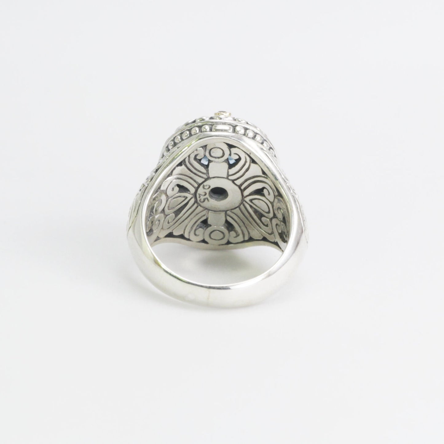 blue topaz ring 925 sterling silver decorated with filigree ornament and 18 K yellow gold