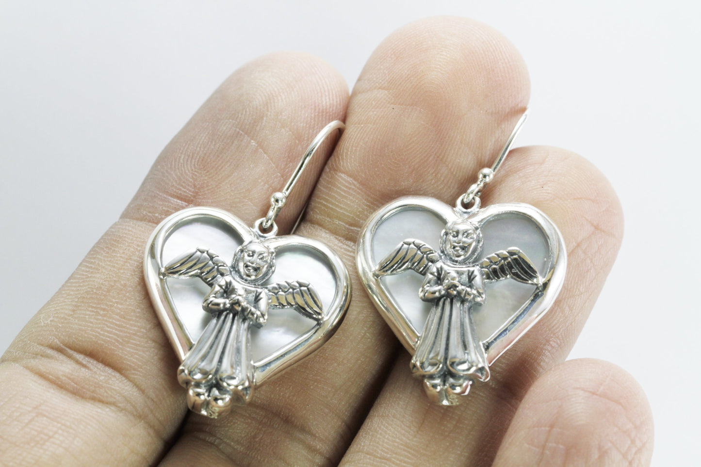 silver angel earrings with natural white shell set in 925 sterling silver