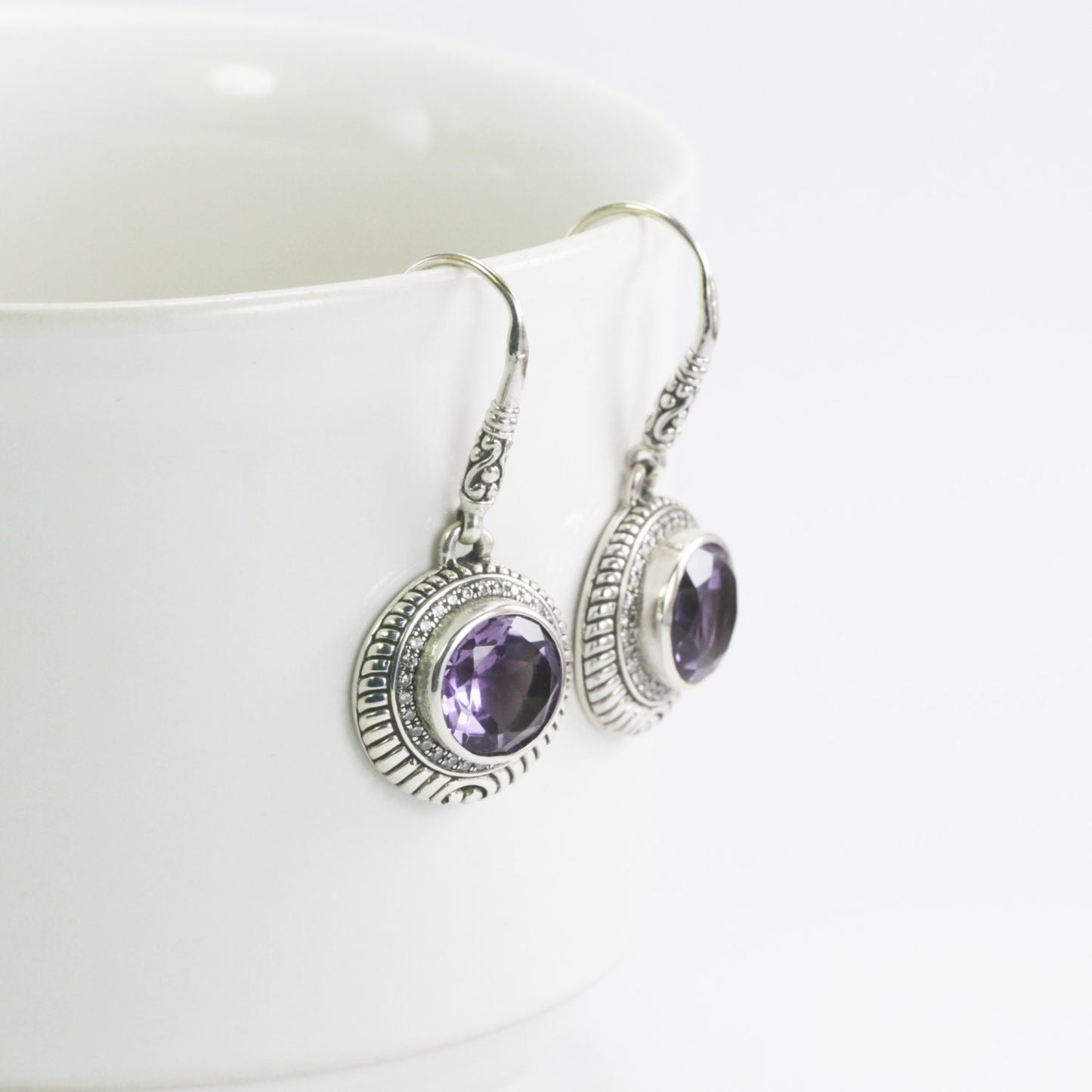 amethyst earrings round shape set in 925 sterling silver decorated with white topaz pave and cable rope edge