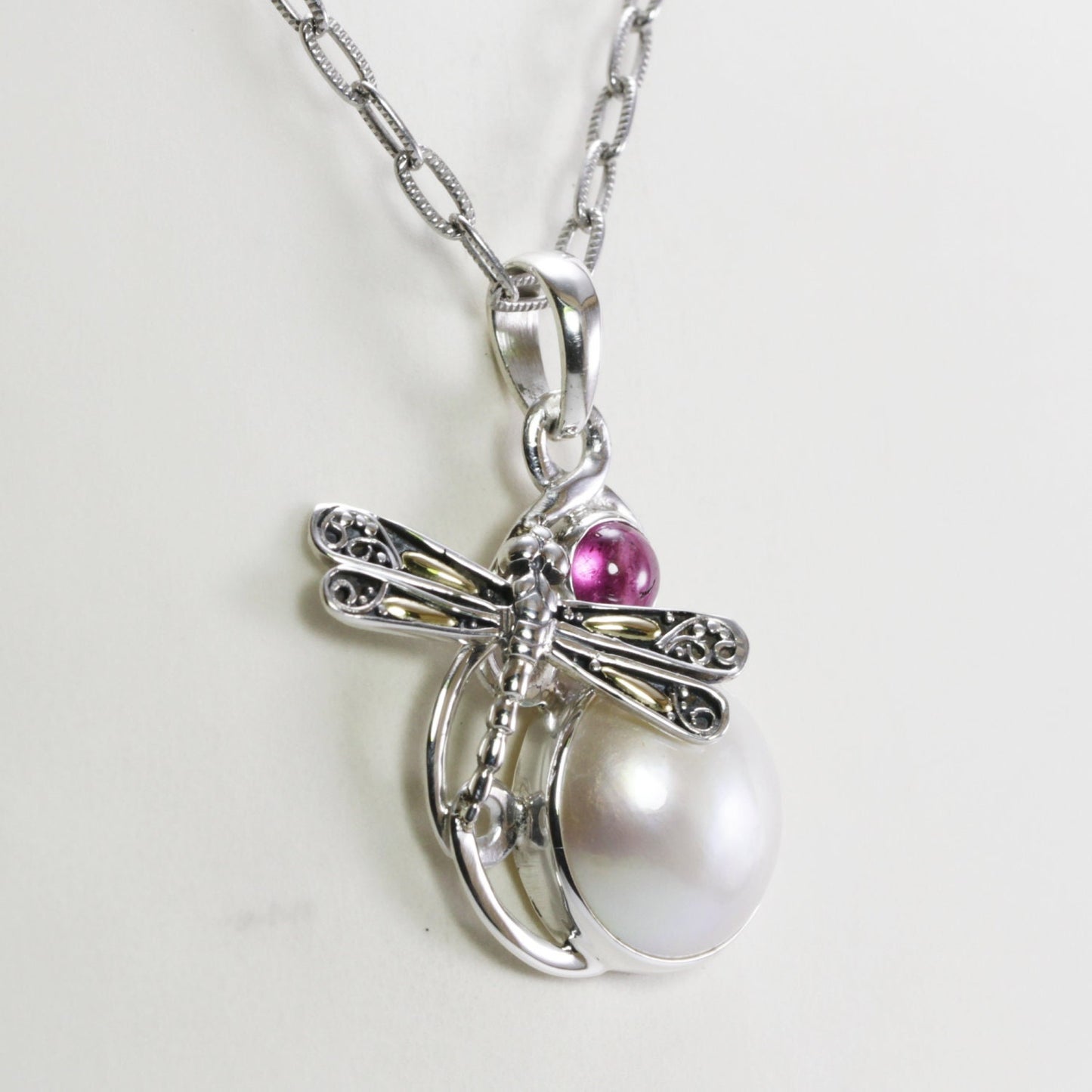 Beautiful handmade Dragonfly Pendant with natural Pink tourmaline and genuine Round mabe pearl decorated with 18K yellow gold on the wings