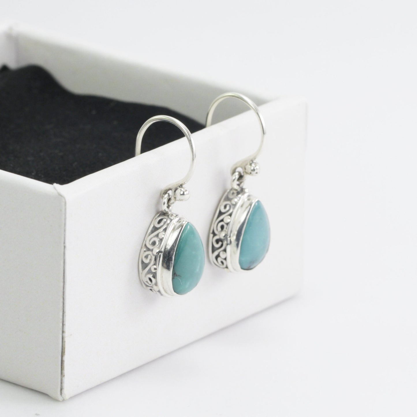 Natural Teardrop Turquoise Dangling Earrings set in 925 Sterling Silver Decorated with Handmade Filigree Bezel