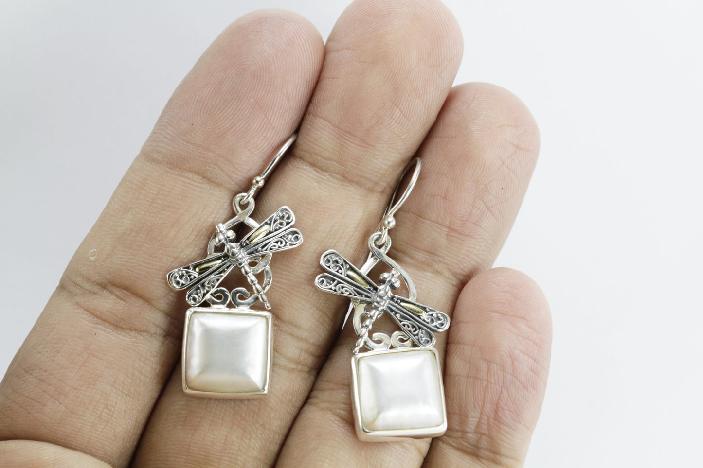 square pearl earrings set in 925 sterling silver decorated with two tone dragonfly ornament 18 K gold