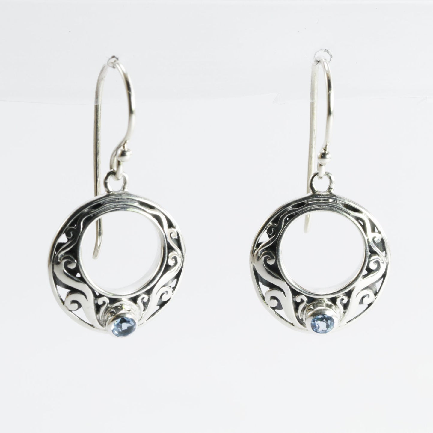 circle earrings with genuine swiss blue topaz set in 925 sterling silver decorated with Bali swirl filigree ornament