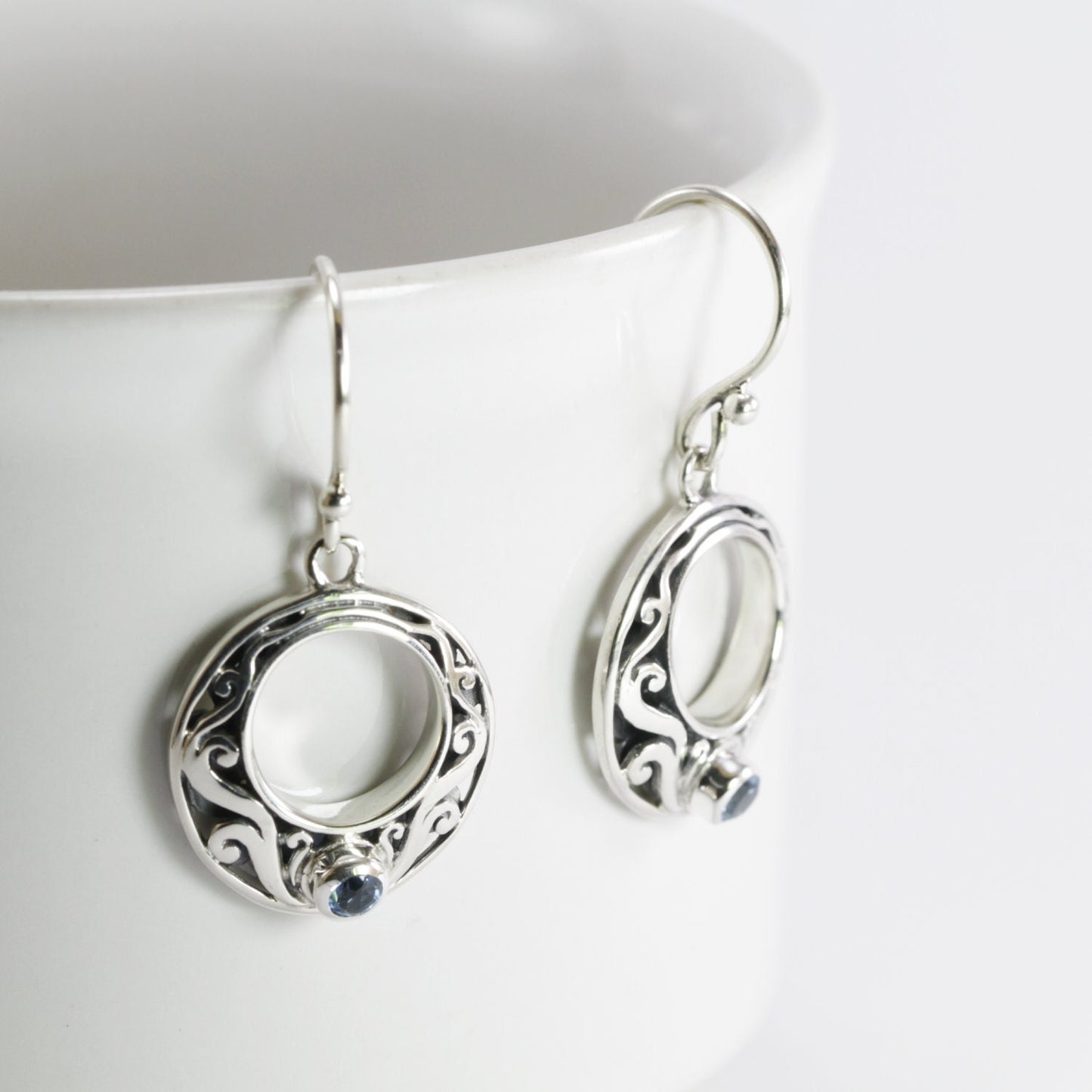 circle earrings with genuine swiss blue topaz set in 925 sterling silver decorated with Bali swirl filigree ornament