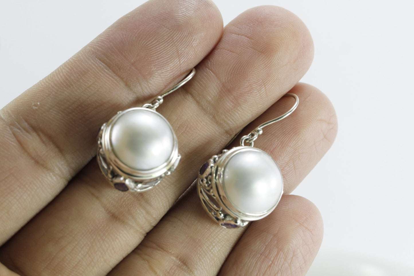 round white mabe pearl earrings decorated with genuine teardrop amethyst set in 925 sterling silver