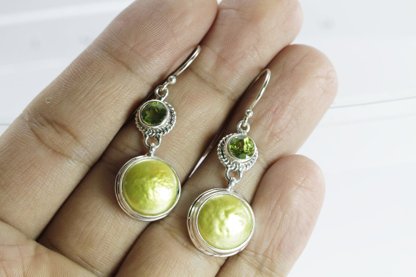green peridot earrings set in 925 sterling silver with green baroque pearl