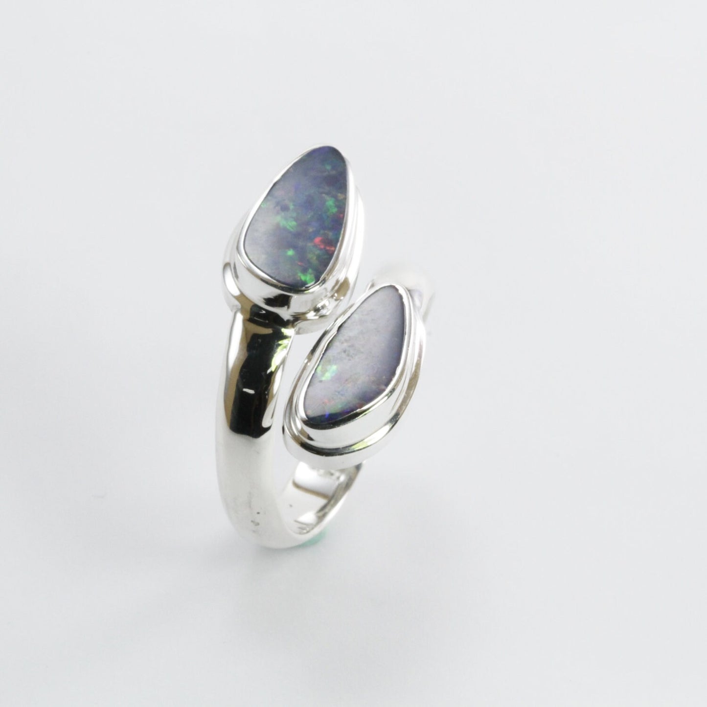 bypass ring with genuine blue opal set in 925 sterling silver, opal ring