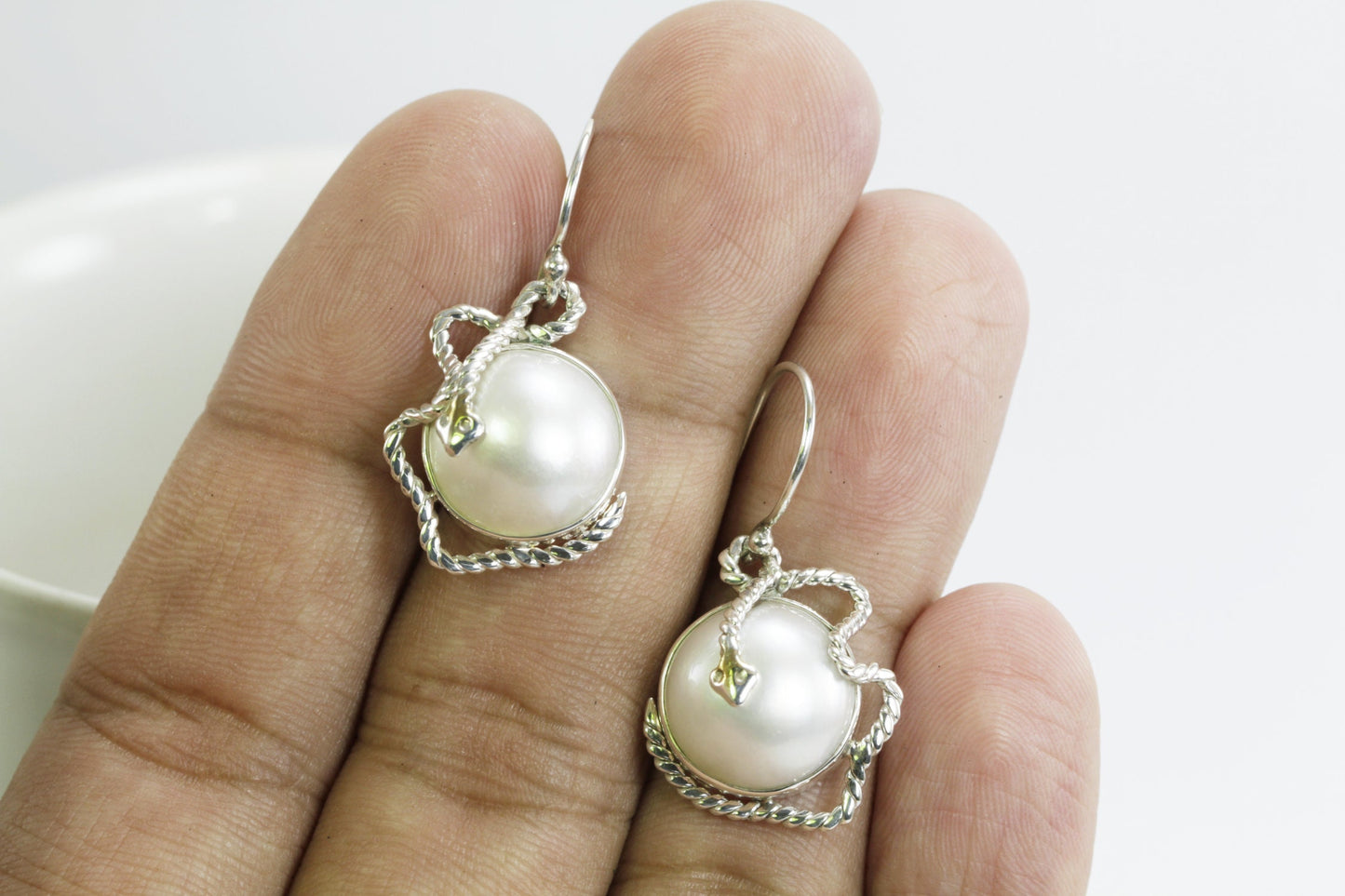 white mabe pearl earrings set in 925 sterling silver with realistic snake carving, snake earrings with pearl