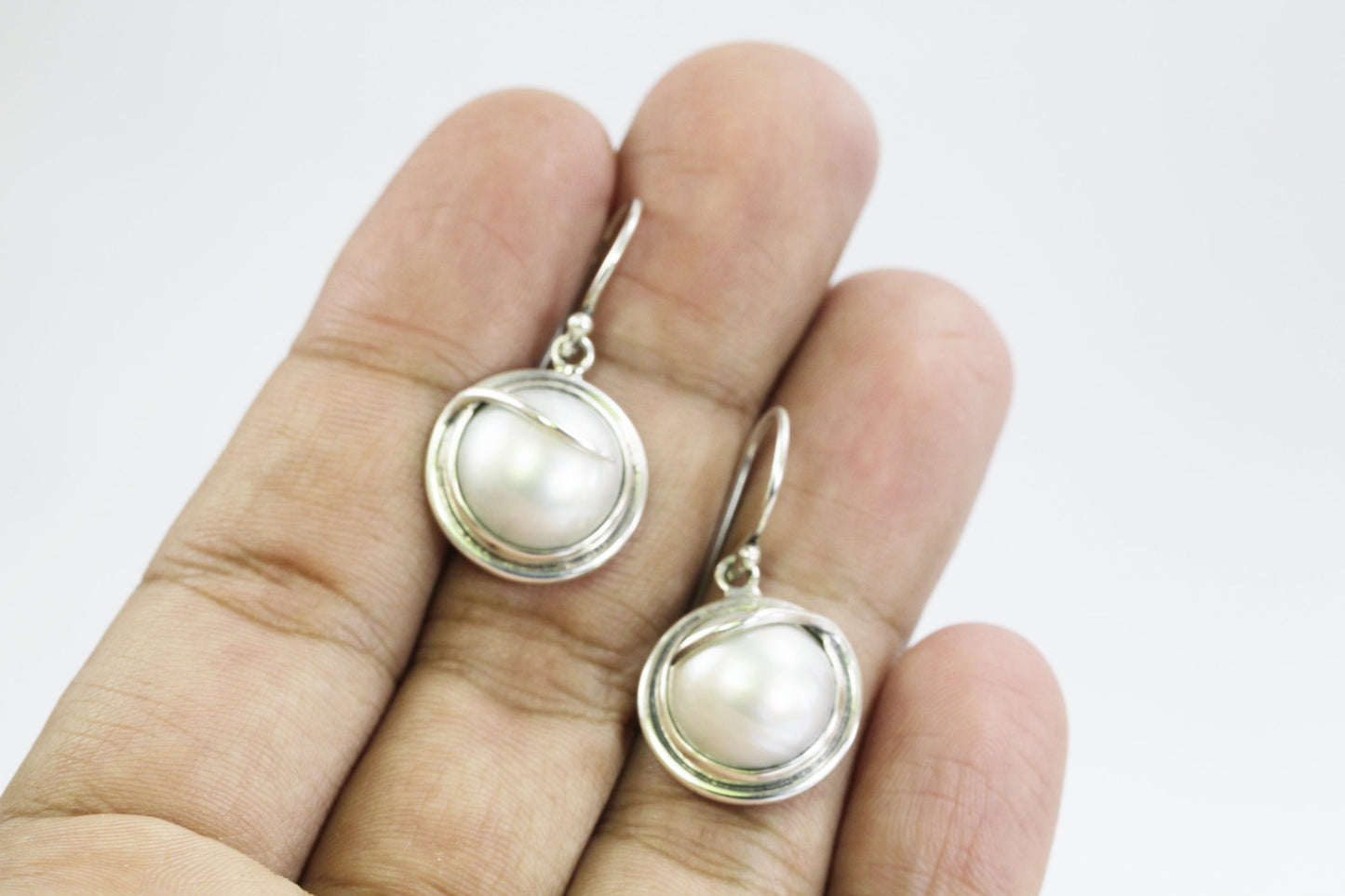 white mabe pearl earrings 925 sterling silver decorated with rope style