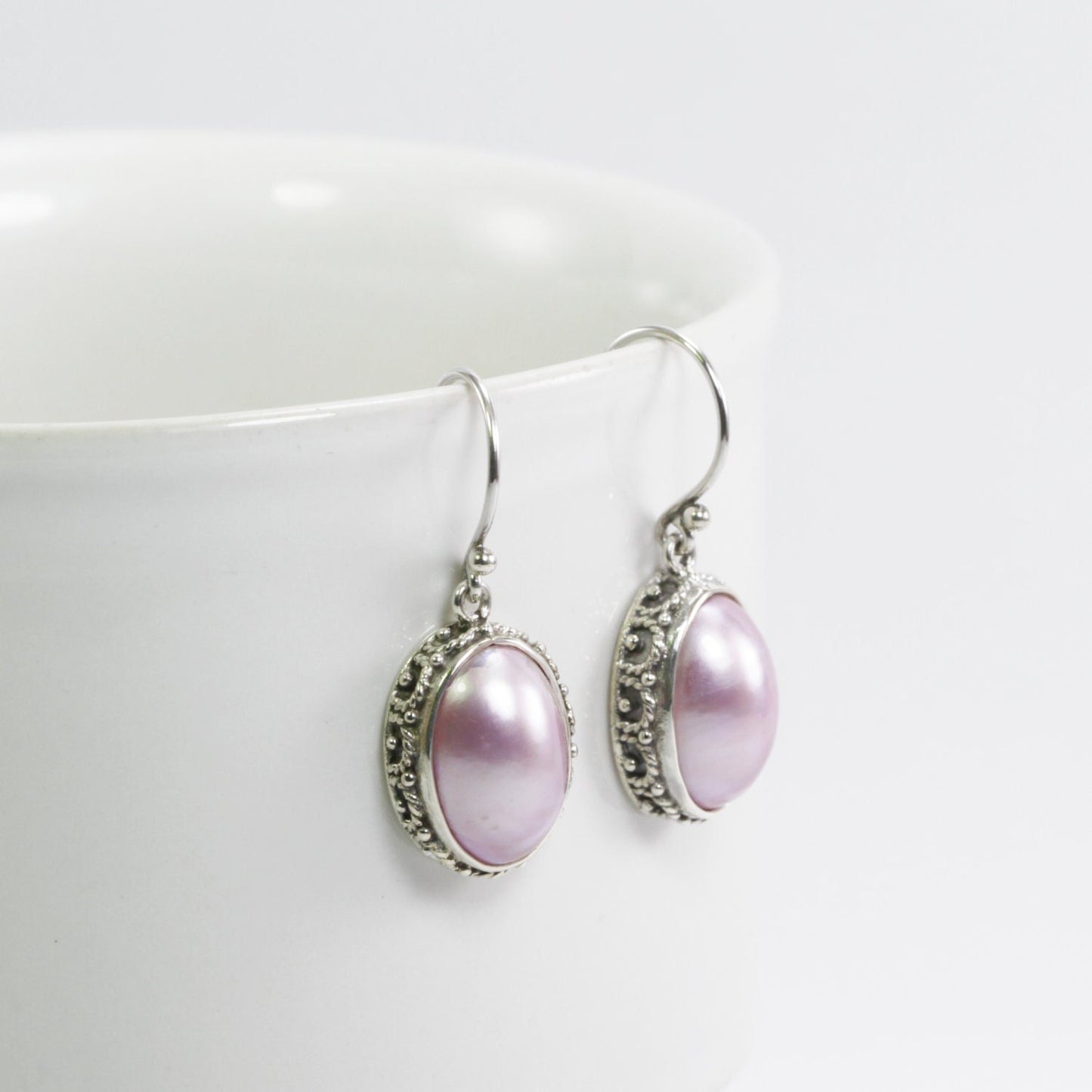 oval mabe pearl earrings set in 925 sterling silver 10*14 mm oval shape decorated with ornament crown