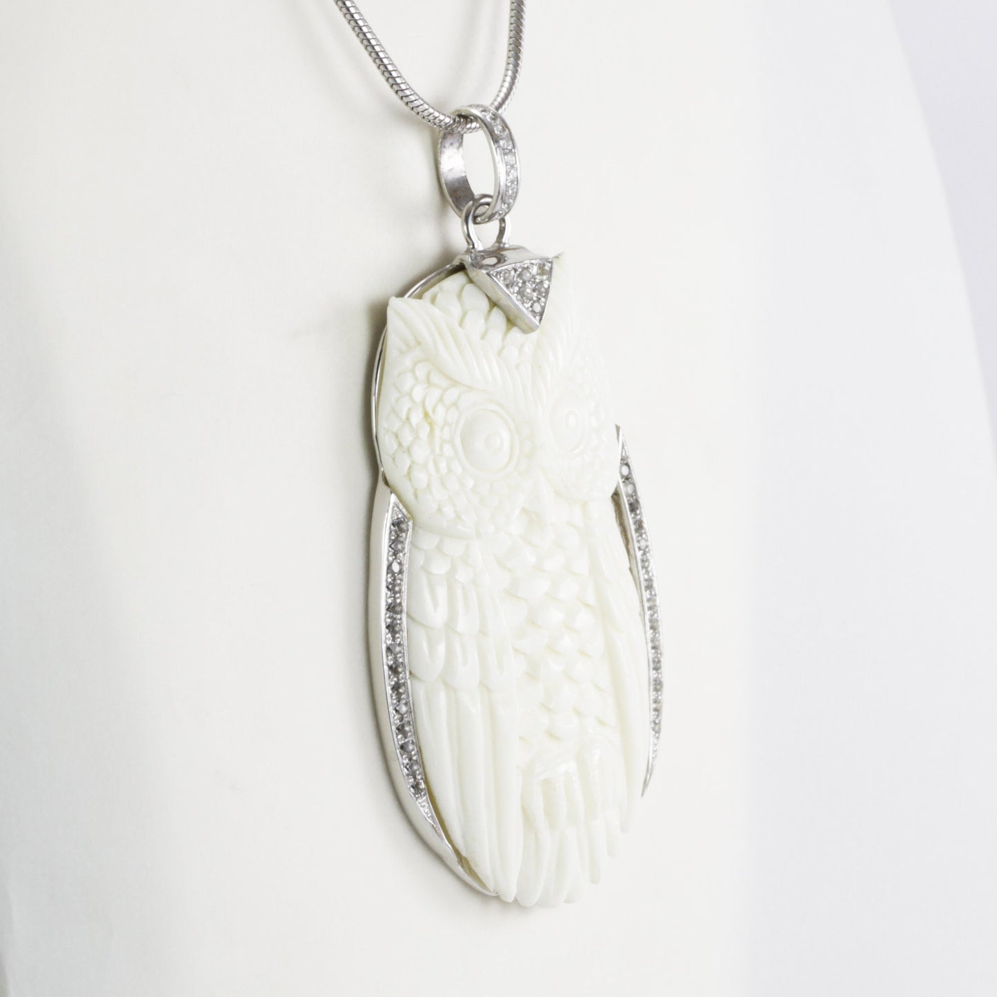 Owl Pendant necklace bone carving decorated with white topaz set in 925 sterling silver