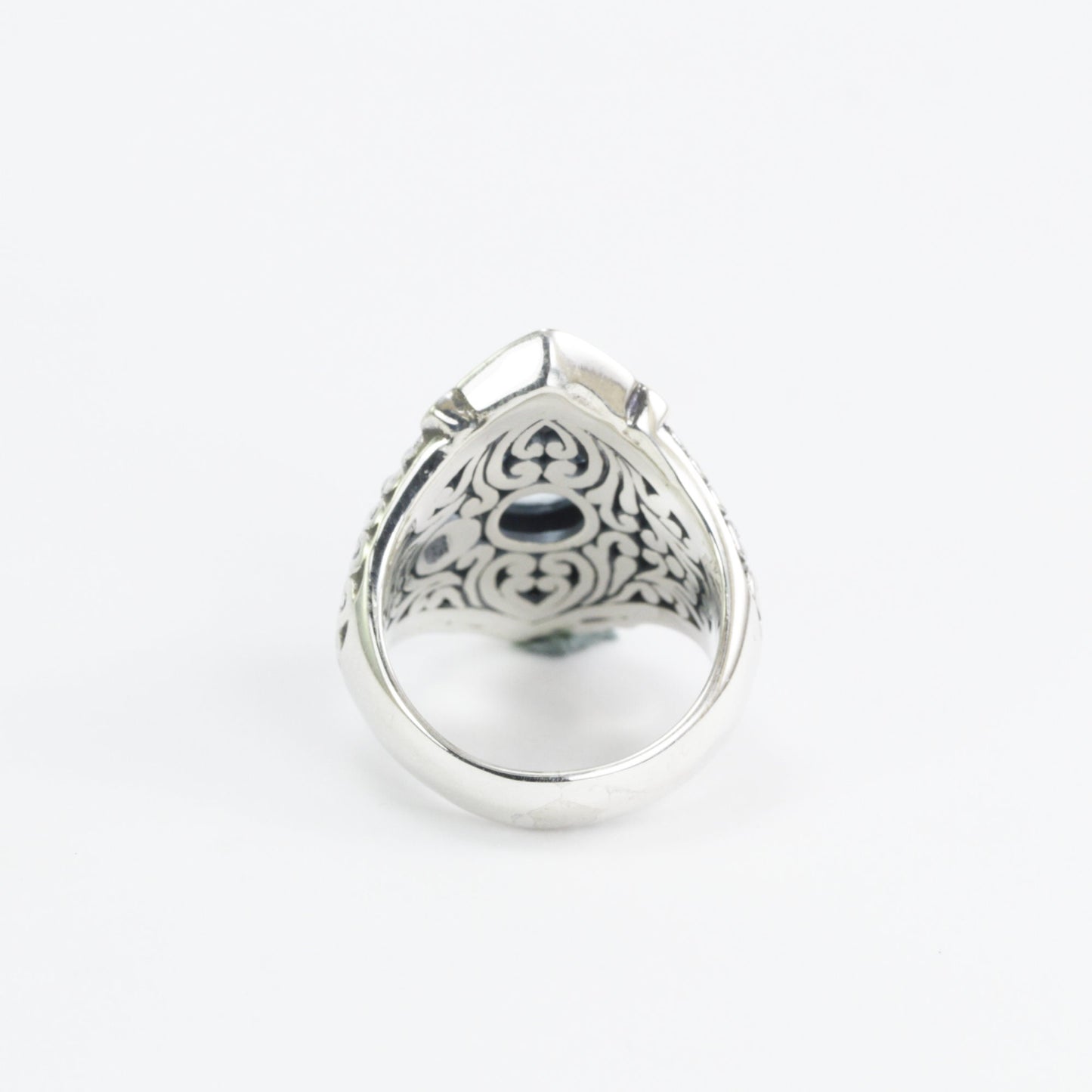 Wide band ring for women with round blue topaz set in 925 sterling silver decorated with filigree carving
