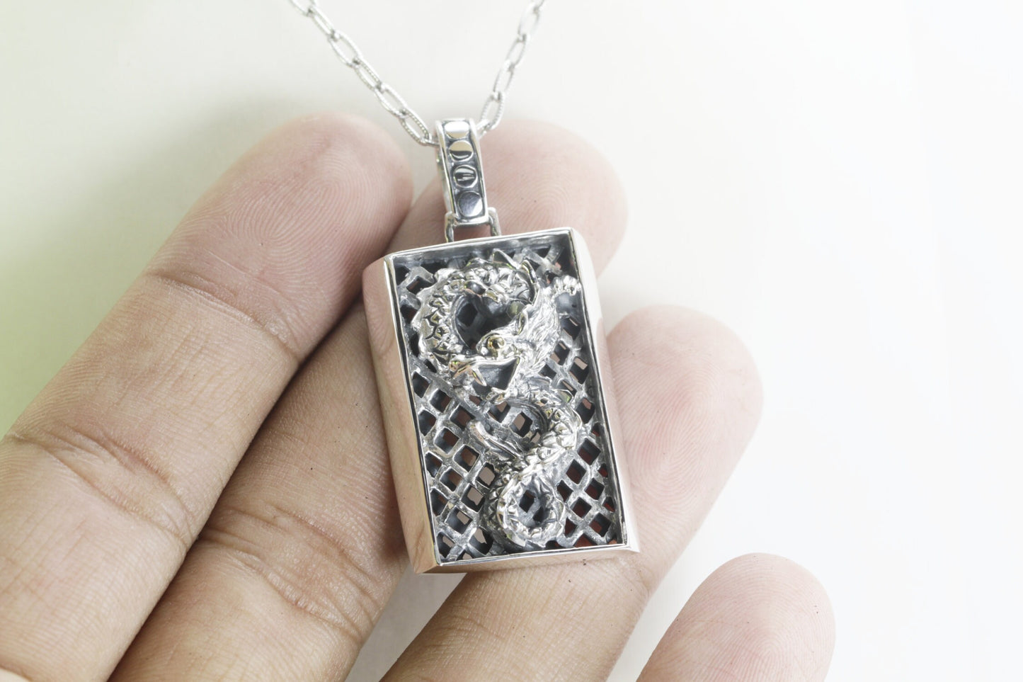 silver dragon necklace pendant decorated with 18K yellow gold on the eye, dragon pendant silver