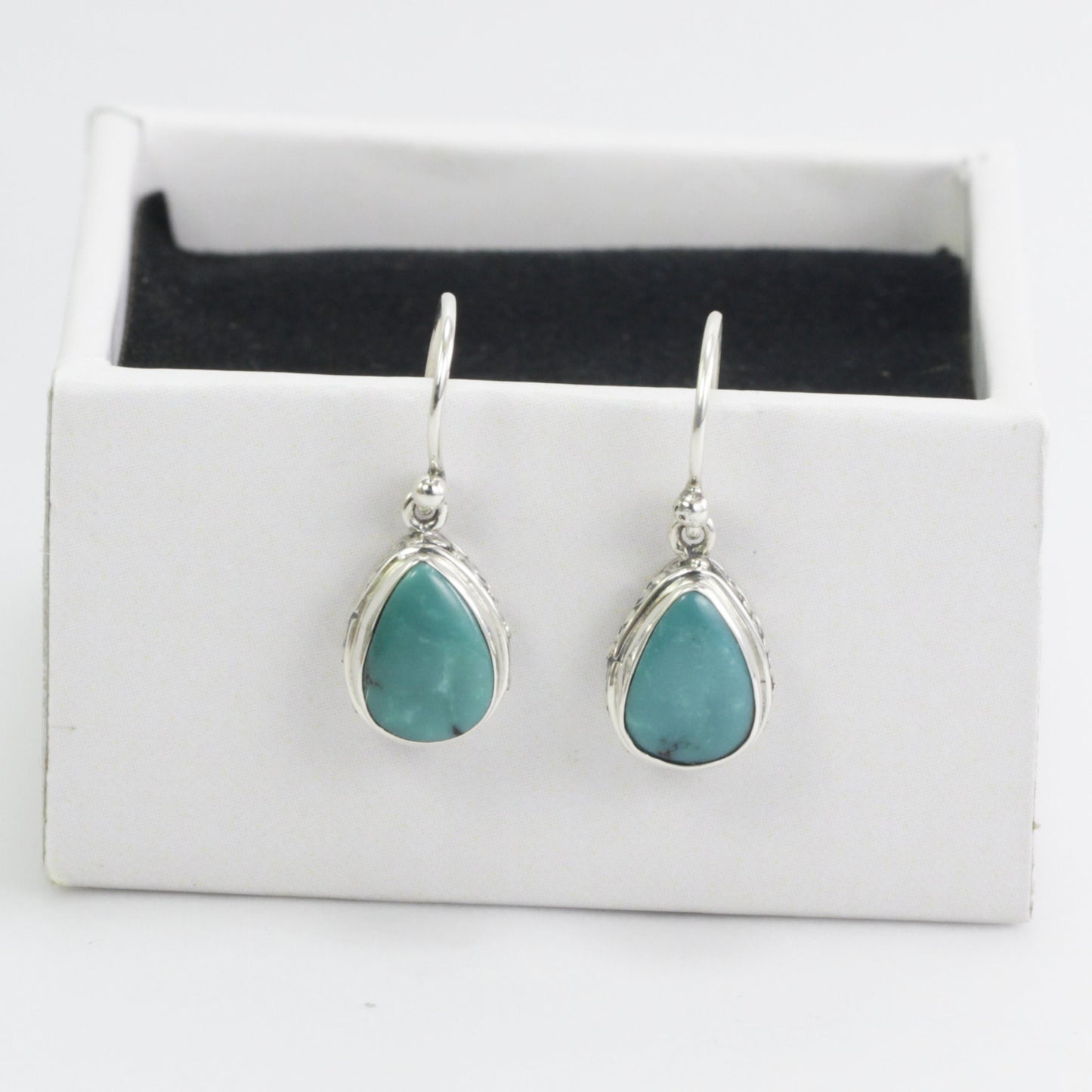 Natural Teardrop Turquoise Dangling Earrings set in 925 Sterling Silver Decorated with Handmade Filigree Bezel