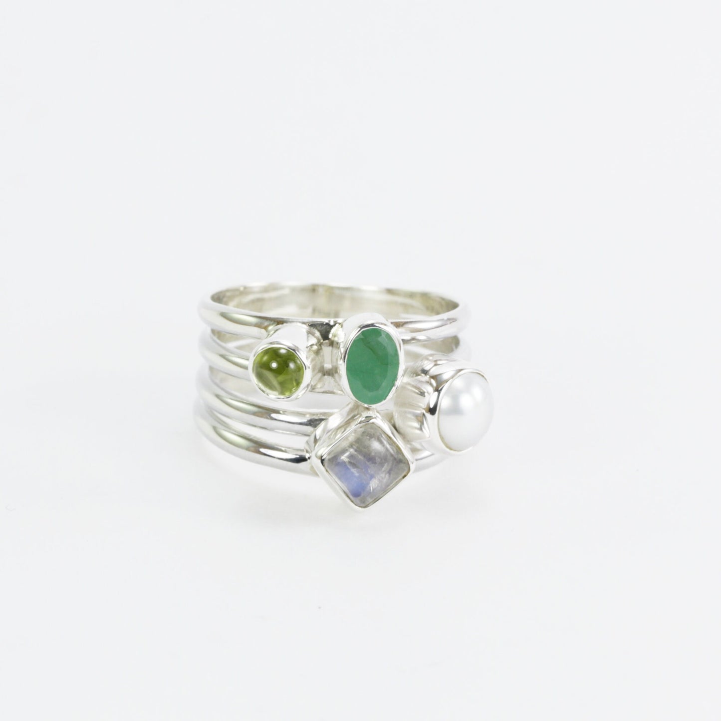 multi stone ring with emerald, peridot, moonstone, and fresh water pearl set in 925 sterling silver