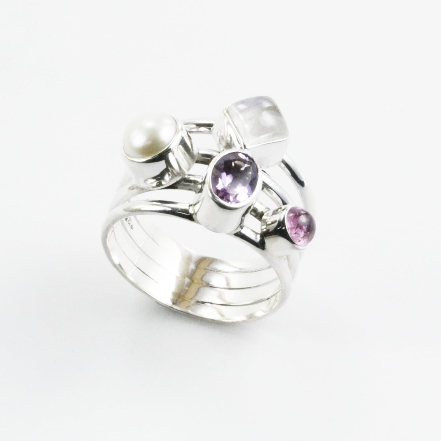 multi stone ring with amethyst, tourmaline, moonstone, and fresh water pearl set in 925 sterling silver