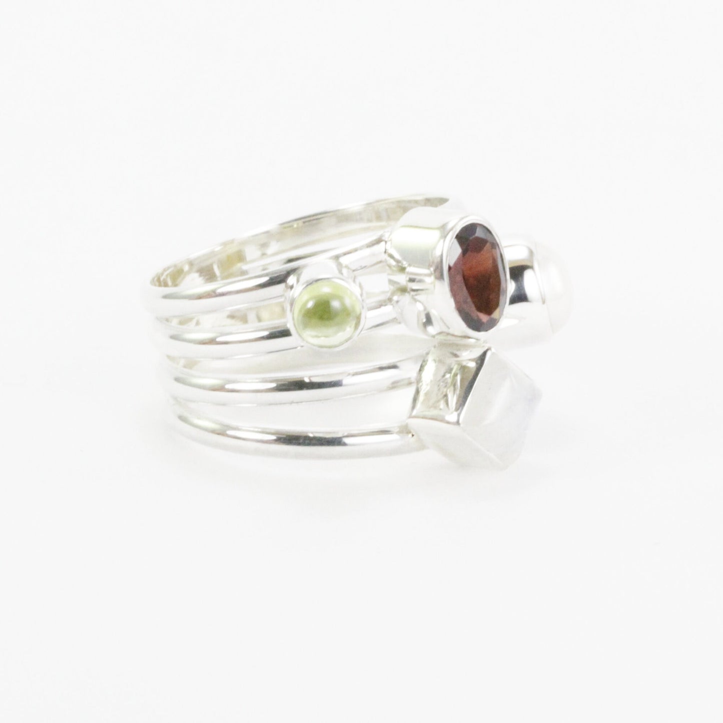 Multi color stone ring with garnet, peridot, moonstone, and fresh water pearl set in 925 sterling silver