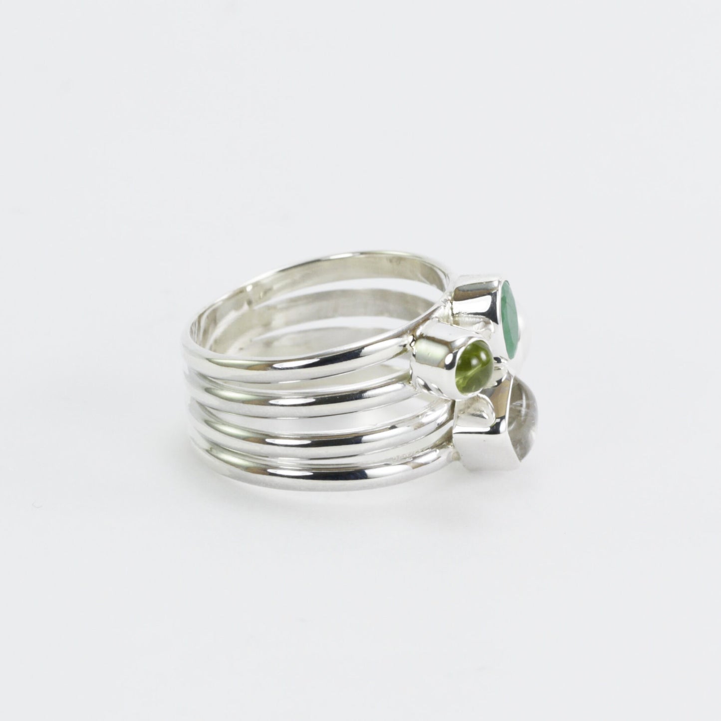 multi stone ring with emerald, peridot, moonstone, and fresh water pearl set in 925 sterling silver