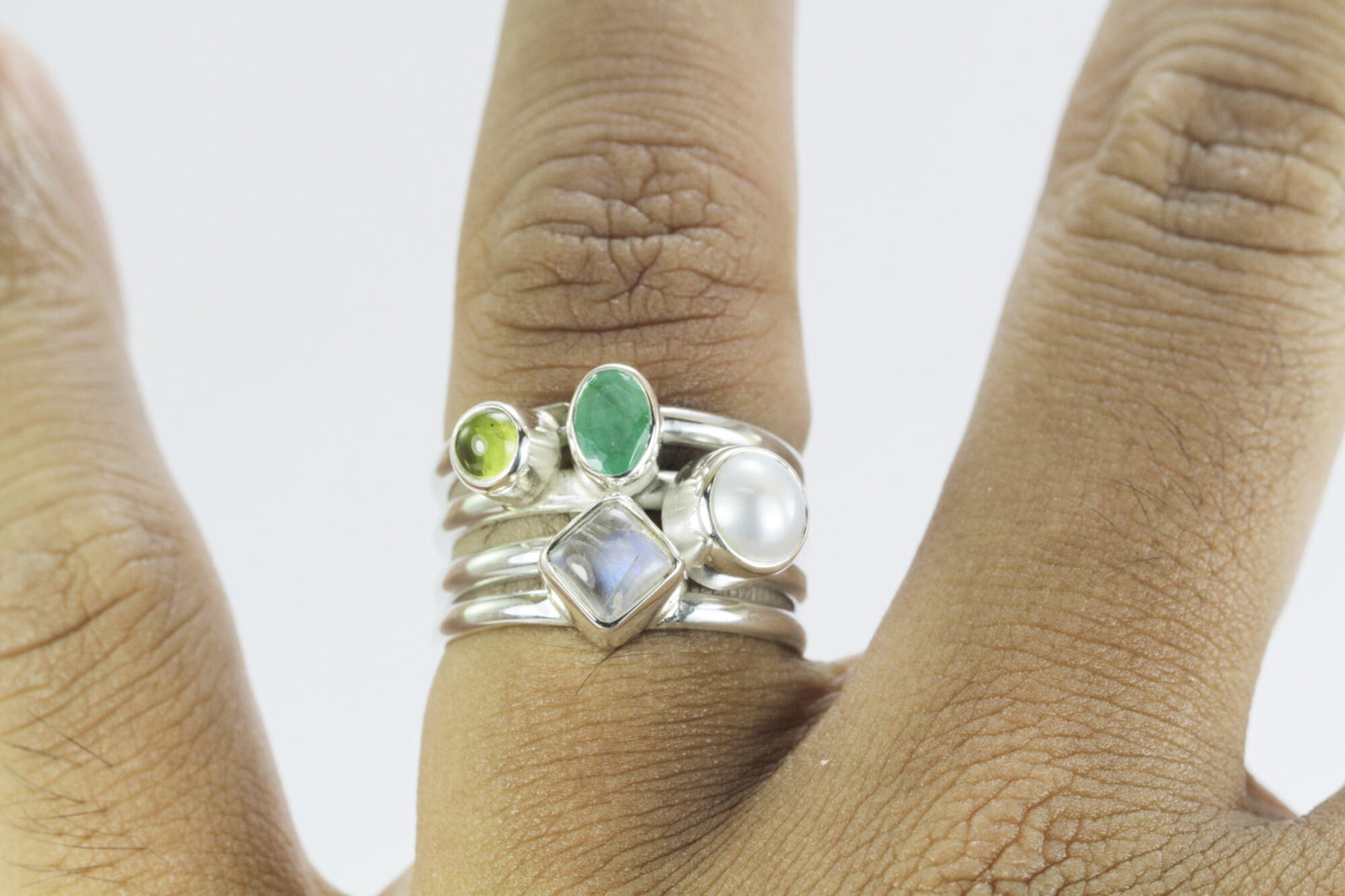 multi stone ring with emerald, peridot, moonstone, and fresh water pearl set in 925 sterling silver