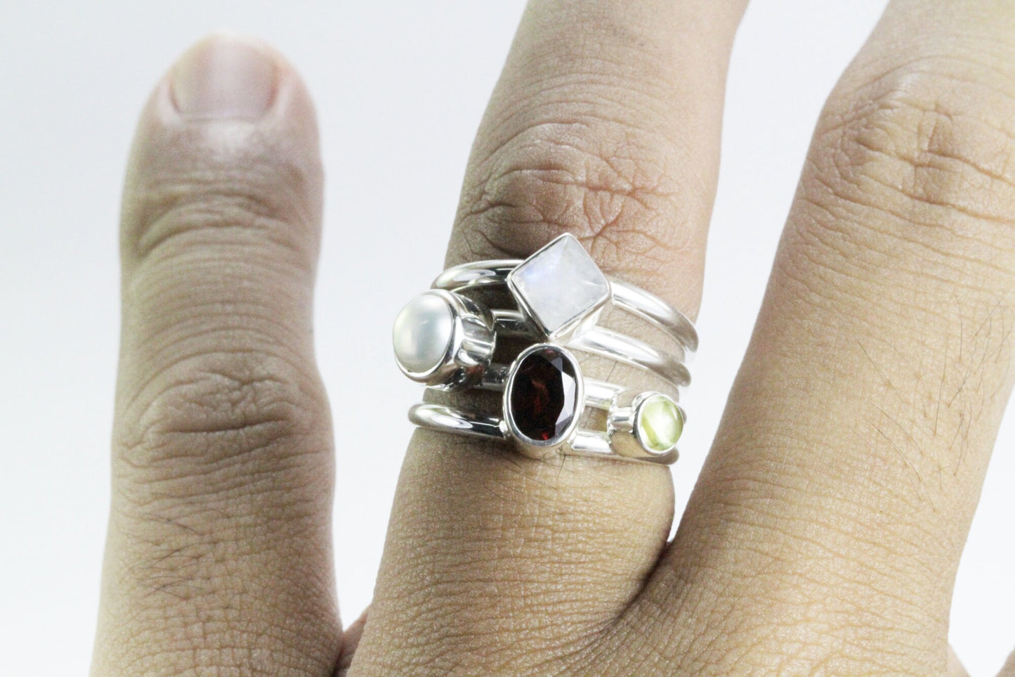 Multi color stone ring with garnet, peridot, moonstone, and fresh water pearl set in 925 sterling silver