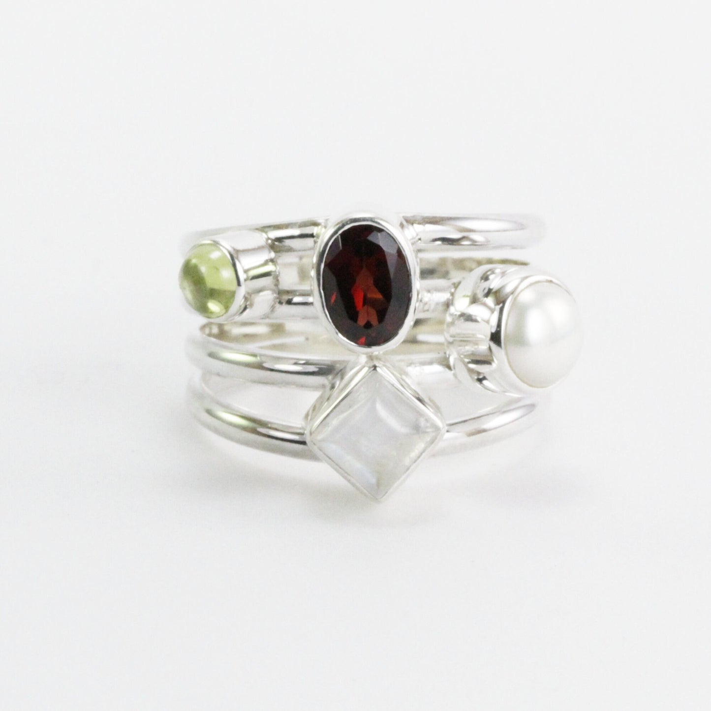 Multi color stone ring with garnet, peridot, moonstone, and fresh water pearl set in 925 sterling silver