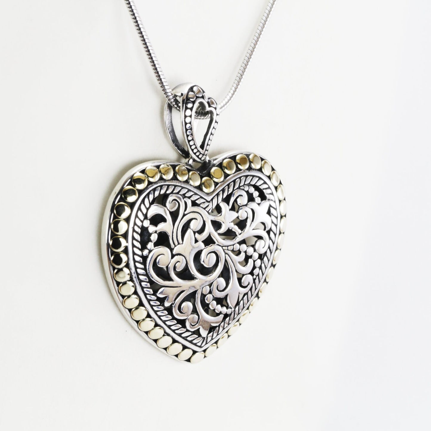 Heart shape pendant necklace 925 sterling silver decorated with open work royal filigree and 18K gold accent