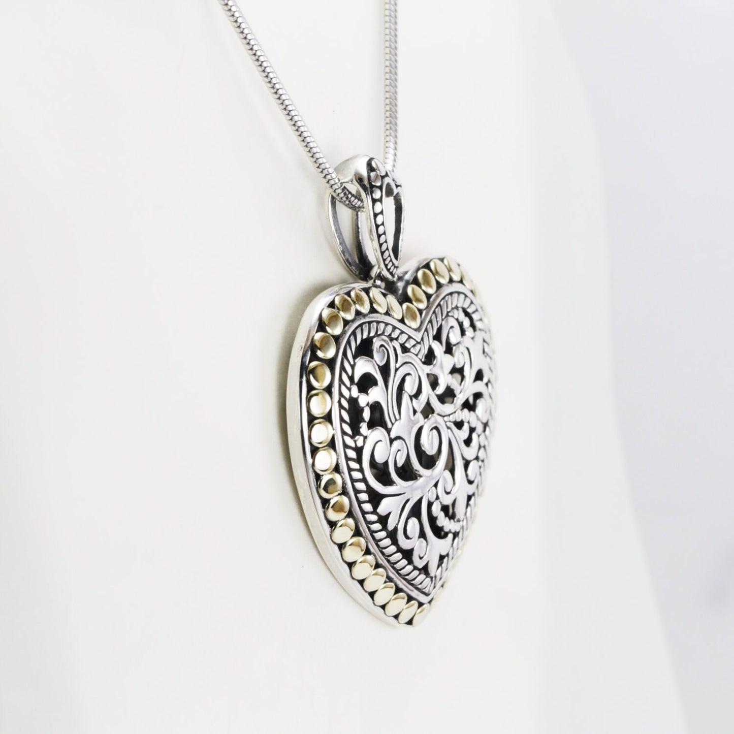 Heart shape pendant necklace 925 sterling silver decorated with open work royal filigree and 18K gold accent