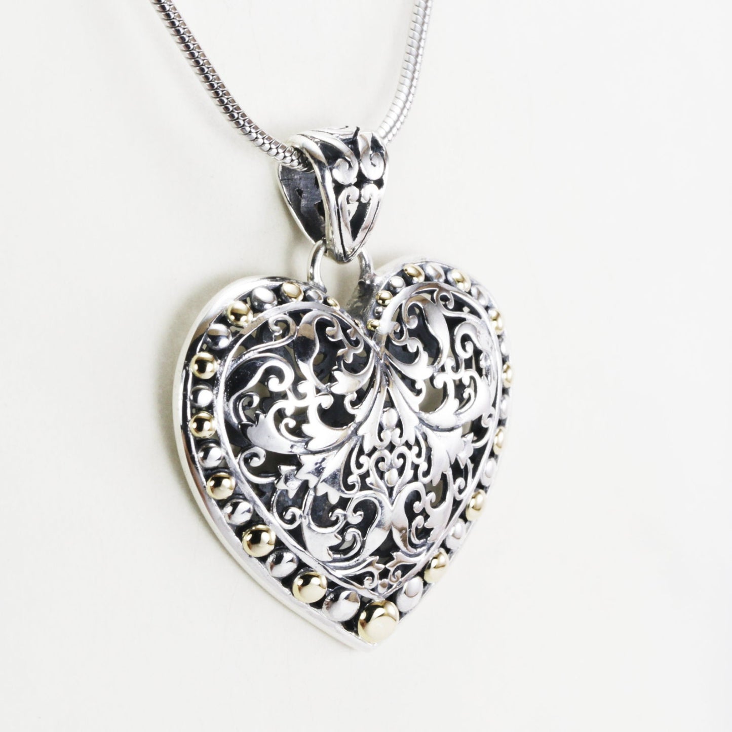 Heart pendant necklace 925 sterling silver decorated with open work royal filigree and 18K gold accent