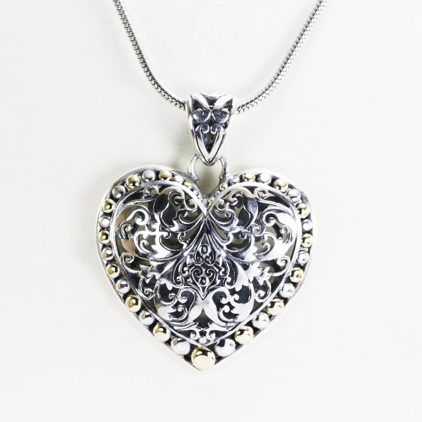 Heart pendant necklace 925 sterling silver decorated with open work royal filigree and 18K gold accent