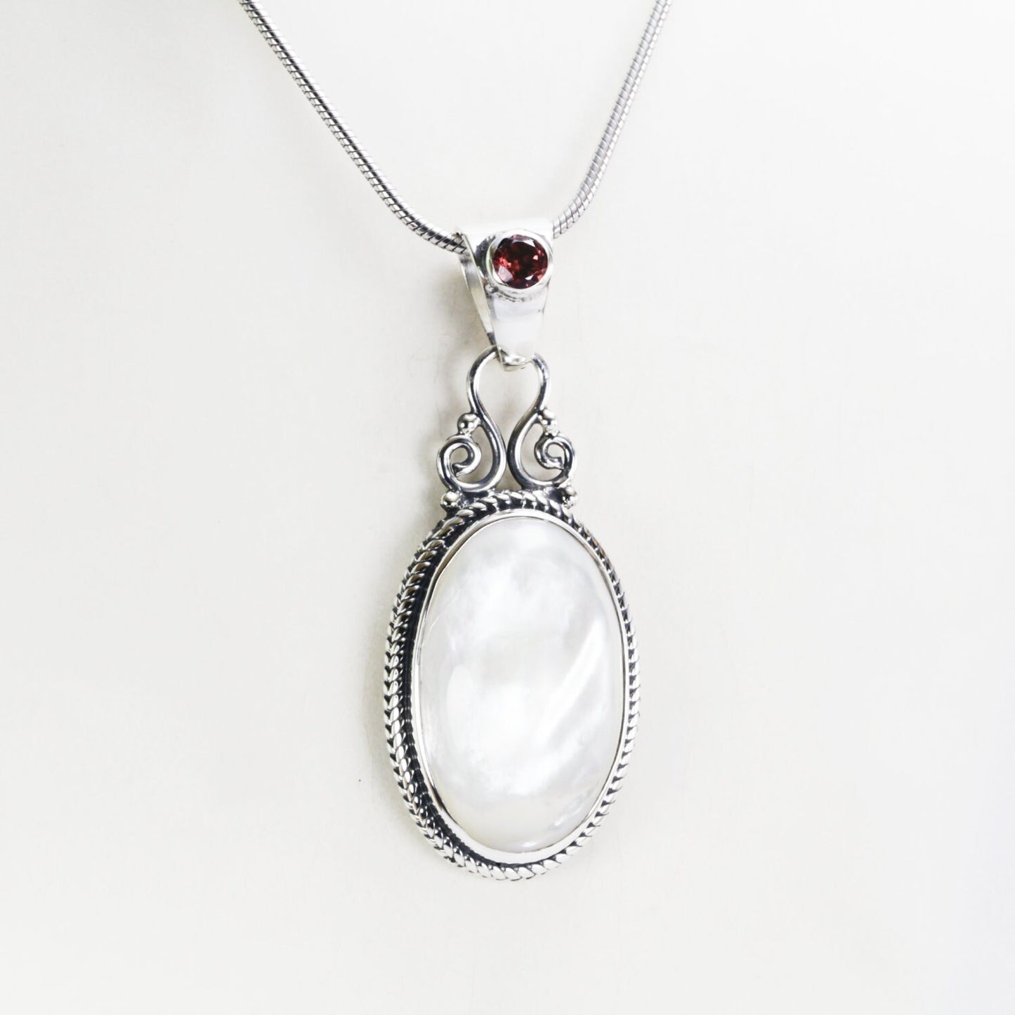 Mother of pearl pendant necklace with genuine red garnet set in 925 sterling silver cable chain rope
