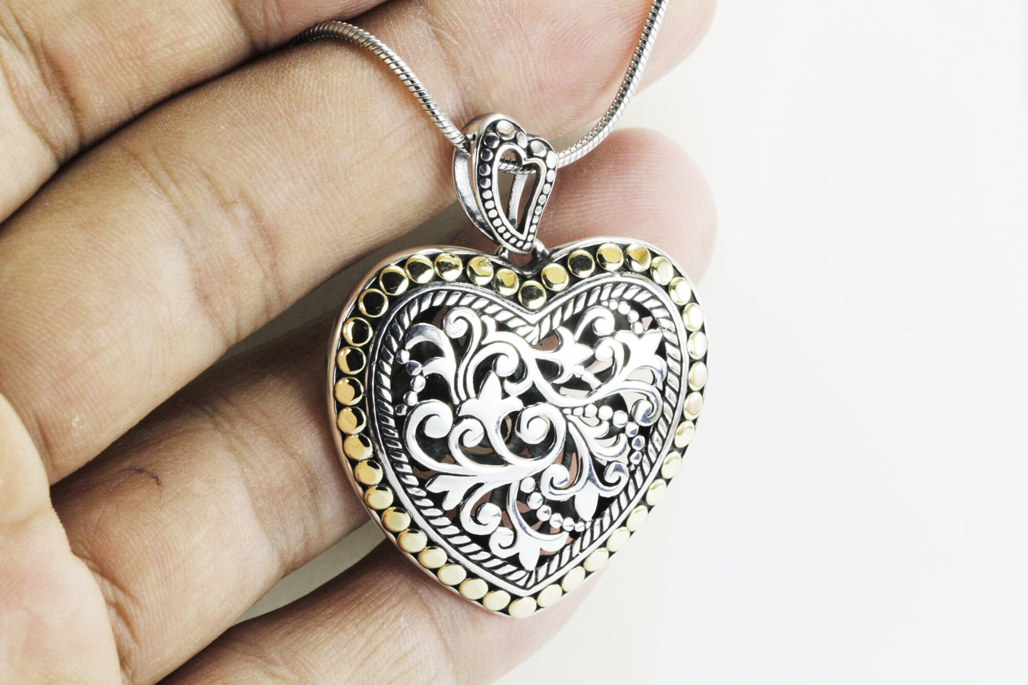 Heart shape pendant necklace 925 sterling silver decorated with open work royal filigree and 18K gold accent