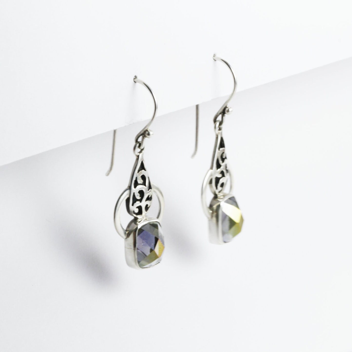 Drop earrings with mystique topaz set in 925 sterling silver