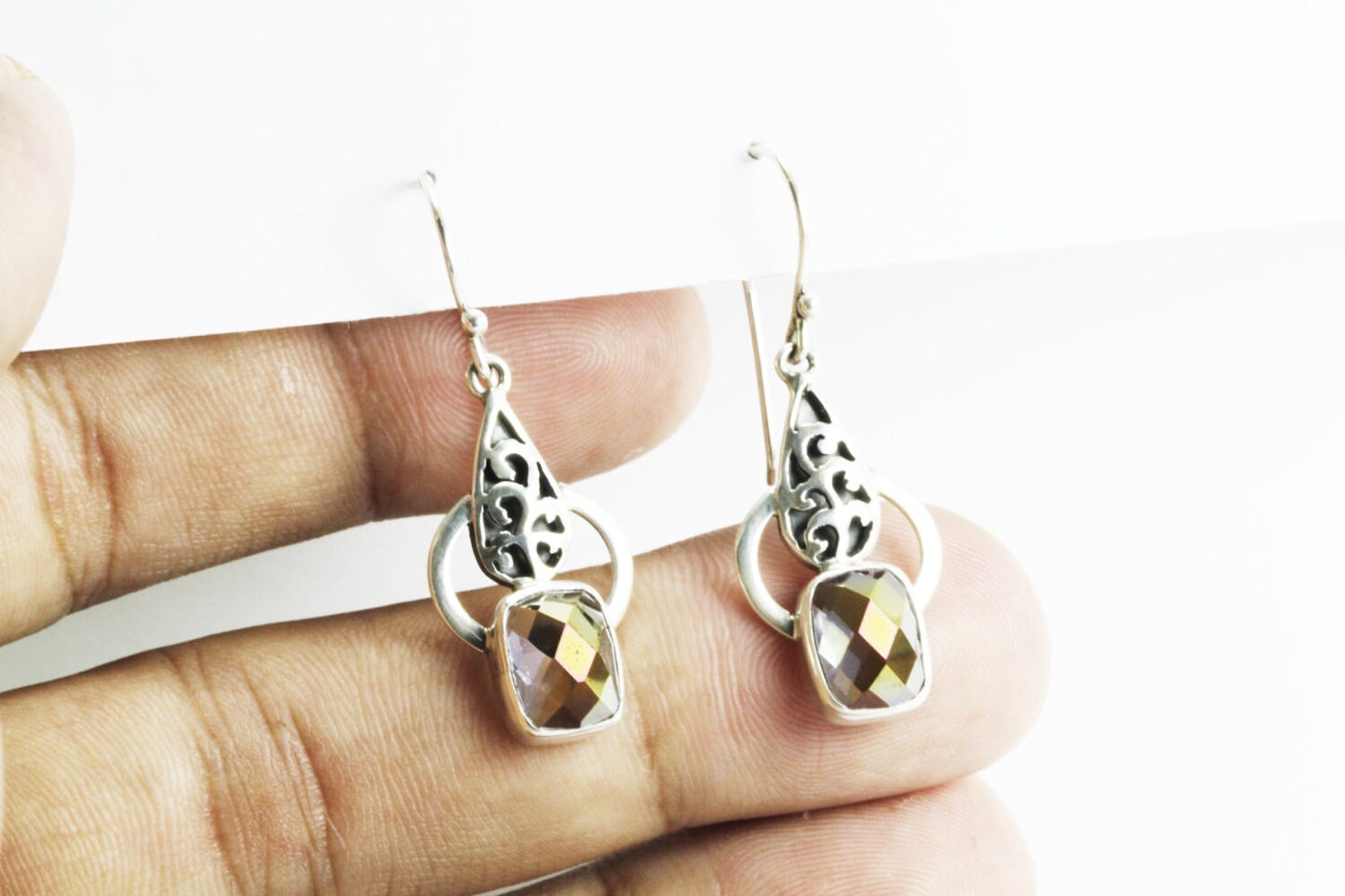 Drop earrings with mystique topaz set in 925 sterling silver
