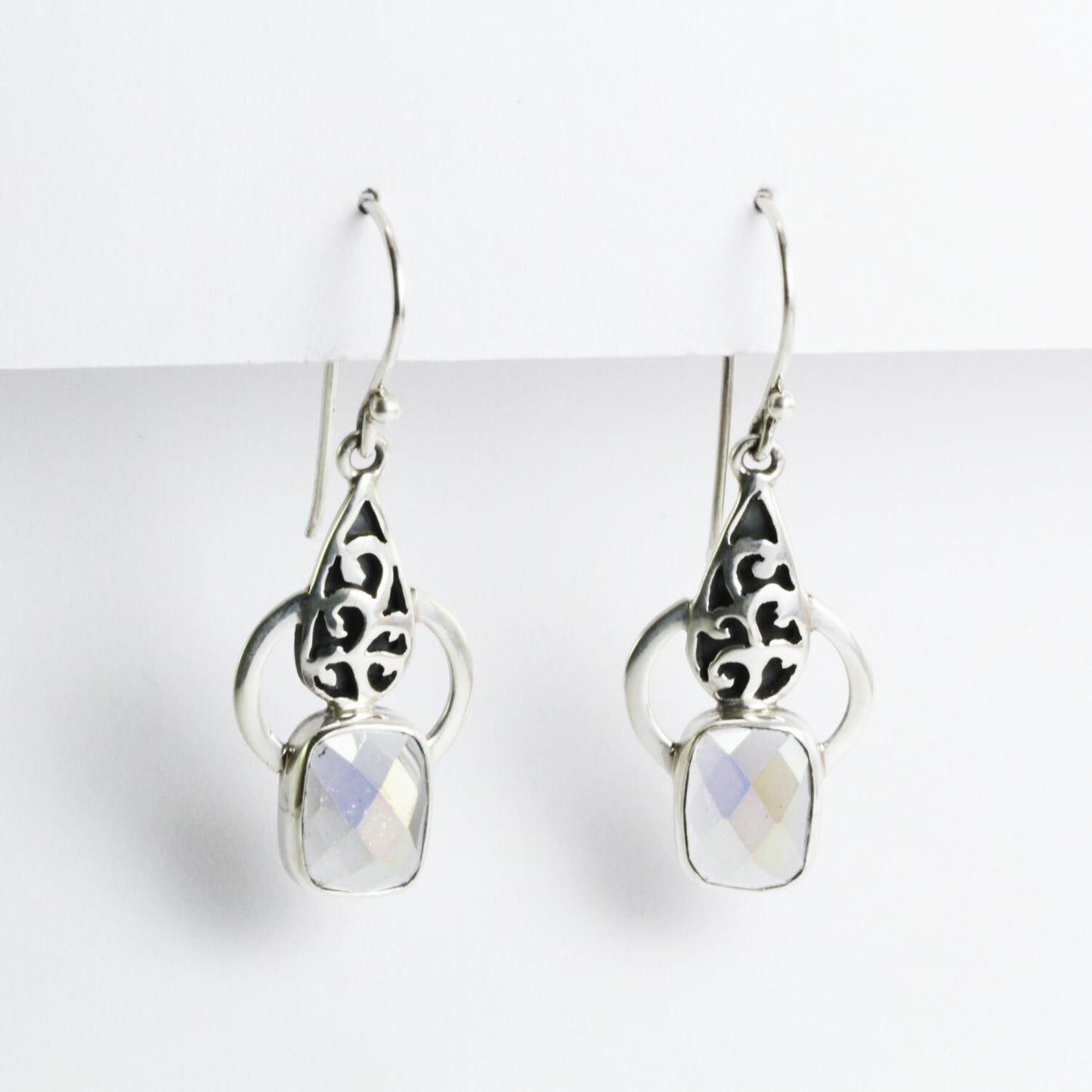Drop earrings with mystique topaz set in 925 sterling silver