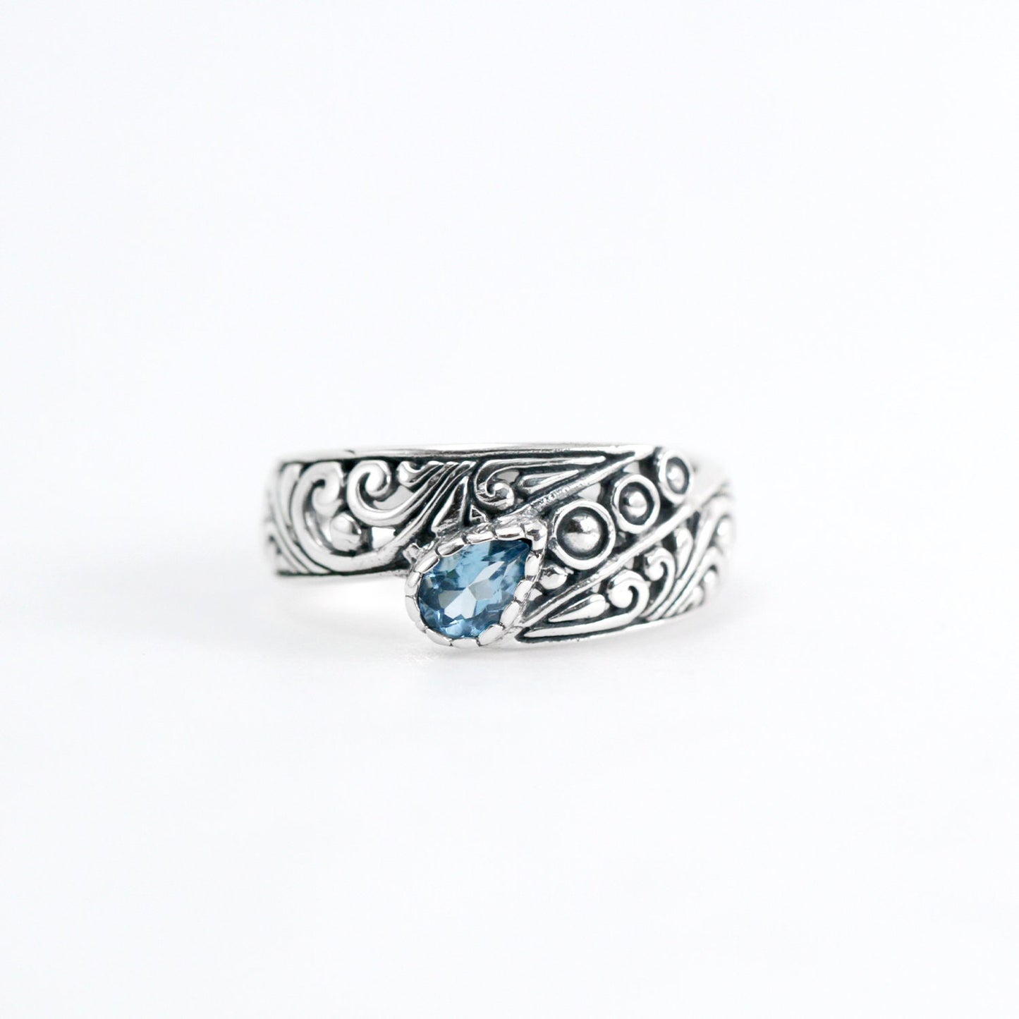 open work ring with genuine blue topaz in 925 sterling silver