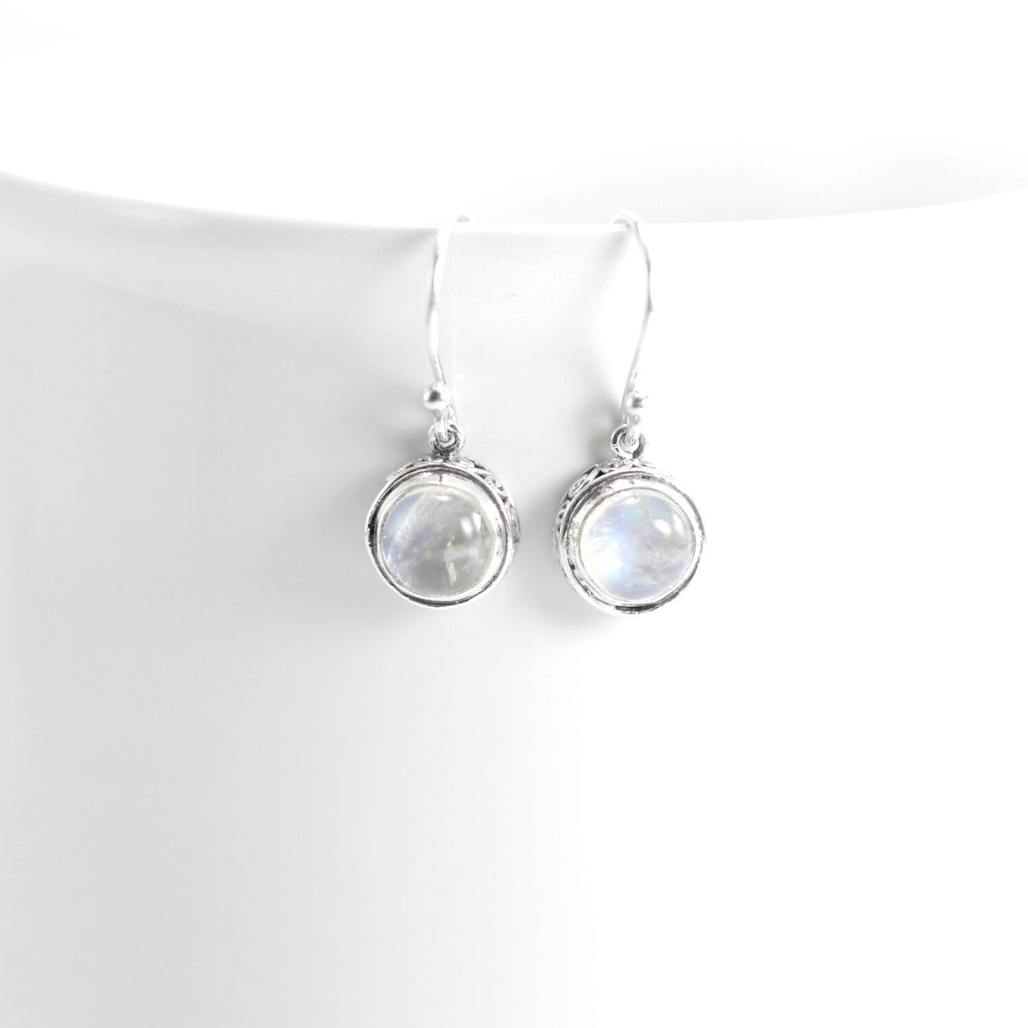 Moonstone earrings set in 925 sterling silver round dangle decorated with filigree edge